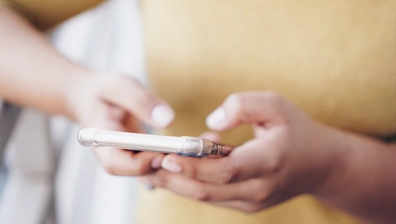 Person holding mobile phone